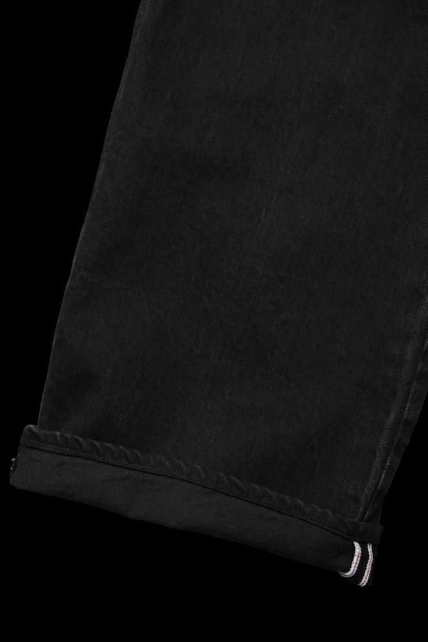 THE DENIM STRETCH SELVEDGE DENIM LOOSE FLARE PANTS “ONEWASH.BLACK”