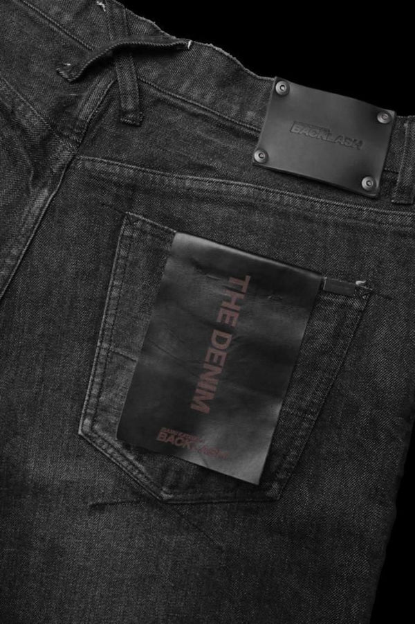 THE DENIM STRETCH SELVEDGE DENIM LOOSE FLARE PANTS “DARK.BLACK”