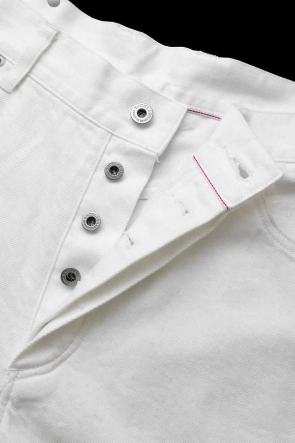 THE DENIM STRETCH SELVEDGE DENIM LOOSE FLARE PANTS “ONEWASH.WHITE”