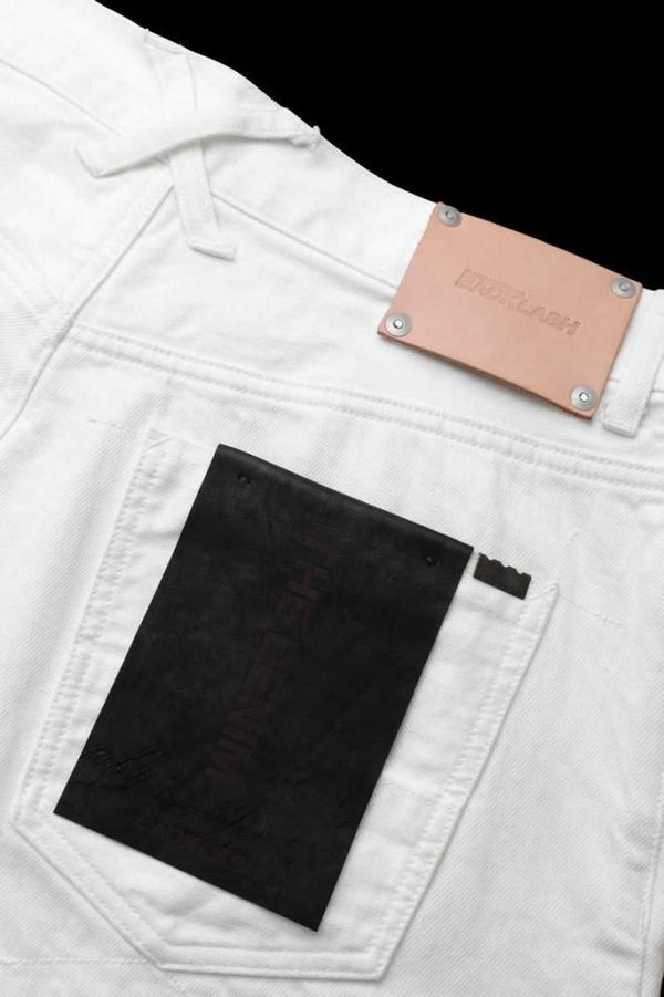 THE DENIM STRETCH SELVEDGE DENIM LOOSE FLARE PANTS “ONEWASH.WHITE”